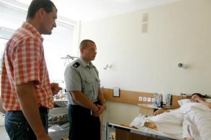Šūvis: A.Gaižauskui kontrabandininkas peršovė koją, jo kolegą kulka perskrodė kiaurai.