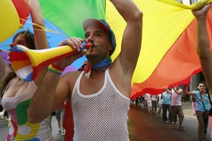 Protestas: seksualinės mažumos ir žmogaus teisių gynėjai tikina, kad Nepilnamečių apsaugos nuo neigiamos viešosios informacijos poveikio įstatymas yra homofobiškas.